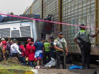 At least 10 killed when freight train hits double-decker bus in Mexico