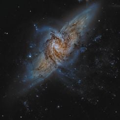 NGC 3314: When Galaxies Overlap