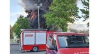 Huge fire engulfs Jysk furniture outlet and Pets Place shop in Limburg; A73 closed