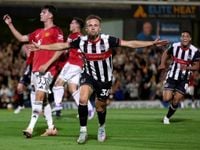 Man Utd dumped out of League Cup on penalties by fourth-tier Grimsby Town