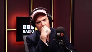 Robbie Williams Eyes Beatles Record With Britpop Album