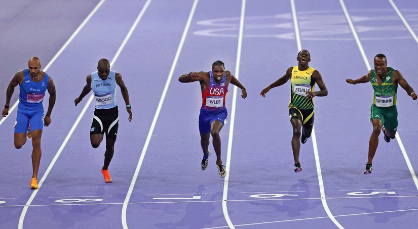 2024 Paris Olimpiyat Oyunlarında erkekler 100 metre finalini Noah Lyles, 9.79'luk derecesi ile ikinci olan rakibi Kishane Thompson'ın 0.005 saniye önünde tamamladı.