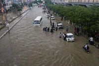 Pakistan restores electricity and reopens roads in areas where floods killed over 300