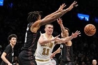 Payton Pritchard scores 32, Celtics beat Nets in 2 OTs