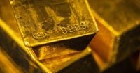 Gold set for third weekly gain as trade war fears rattle markets