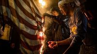 Trump faces backlash from Maga base over flag-burning ban