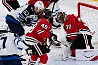 Knight makes 32 saves as the Blackhawks beat Toews and the Jets 2-0