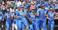 UCLA versus LSU Men's College World Series game suspended until Tuesday