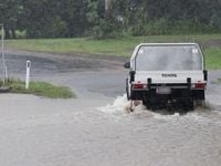 Cardwell businesses call for help after floods and road closures