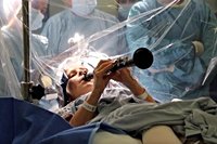 Watch: Woman plays clarinet during four-hour brain surgery for Parkinson’s