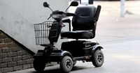 Man in 70s arrested as mobility scooter driver critically injured after 'punch'