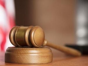 Justice Department Sues LA Sheriff Over Gun Permit Delays