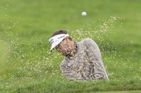 Truist Championship: Mitchell maintains lead after rainy Day 2