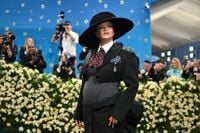 Rihanna reveals baby bump on Met Gala red carpet as she confirms third pregnancy