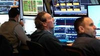 Nasdaq, stocks rally after Fed holds interest rates