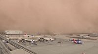 Towering haboob turns day into night in Phoenix as powerful winds knock out power, cause travel chaos