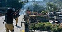 Pakistan opens talks with Kashmir protesters as PM calls for calm after deadly clashes