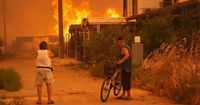 Raging wildfire grounds ALL flights at major airport as tourists trapped