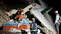 Rescuers desperately search for survivors of earthquake in the Philippines that killed at least 72