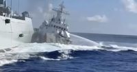 Filipino forces on alert after China deploys coast guard ships closer to disputed shoal