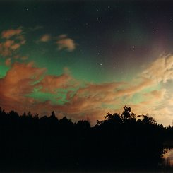Aurora Over Clouds
