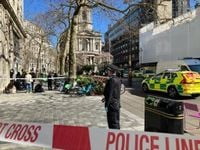 Woman dies as van hits pedestrians close to Somerset House - live