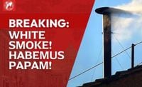 BREAKING: Habemus papam! White smoke rises from chimney of Sistine Chapel