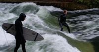 Munich's famous river wave has vanished after a cleanup. Surfers hope it will return soon