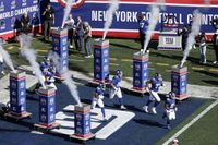 Koch family agrees to buy a 10% stake in the NFL's New York Giants, AP source says