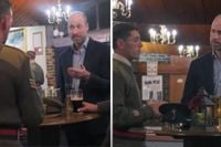 William shares festive pint with Welsh troops during surprise appearance