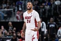 Heat hold on behind Powell’s 36 for signature 118-112 victory over East-leading Pistons