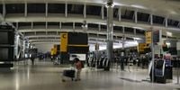 Photos show grounded planes and empty terminals at Heathrow, one of the world's busiest airports, after massive power outage