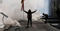 French unions strike against austerity, pressuring Macron