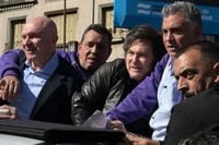 Protesters hurl rocks at Argentinian president Javier Milei amid corruption claims