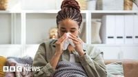 Flu cases in Scotland drop by more than a third