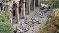 Moment huge blocks of stone plummet onto street narrowly missing passersby