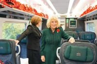 Queen Camilla stuns commuters by riding train for special service