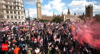 'Bottles, flares, projectiles' hurled: Far-right London rally draws record crowds; why they are protesting - The Times of India