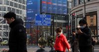 Stocks fall as central banks flag global risks