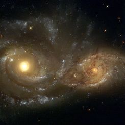 Spiral Galaxies in Collision