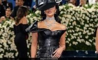 Kim Kardashian Takes On Met Gala 2025 In A Black Faux Leather Off-Shoulder Gown And Hat