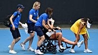 Day 2 as it happened: Player leaves court in wheelchair; Novak ties Open record