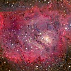 The Lagoon Nebula in Gas, Dust, and Stars