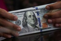 Dollar slips before data, yen outperforms, eyes on Trump-Putin meeting