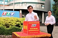 หนังสือพิมพ์ วิทยุ และโทรทัศน์ ไทนิญ ช่วยเหลือผู้ประสบภัยน้ำท่วม