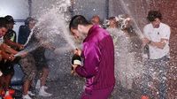 Carlos Alcaraz celebrates U.S. Open victory with tears, hugs, and a champagne shower