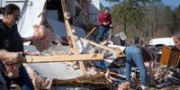 Deadly severe weather outbreak spawns more than 90 tornadoes in 13 states as communities begin to rebuild