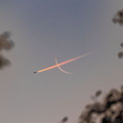  Plane Crossing Crescent Moon 