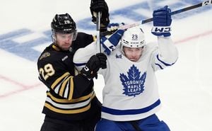 Holmberg Shines With Two Goals To Lead Maple Leafs Over Hurricanes