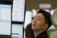 Stocks pull back from their latest all-time highs on Wall Street